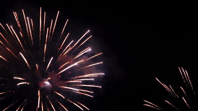 Colorful fireworks. launch of the festive fireworks. 4K slow motion clip of wonderful of fireworks. Magnificent holiday light representation. Beautiful fireworks show on Independence day 120 fps