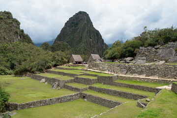 Old stone homes and terraces in the Inca City Machu Picchu