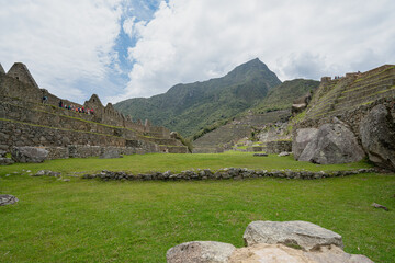 Machu picchu, pre columbian inca site situated on a mountain ridge above the urubamba valley in Peru.