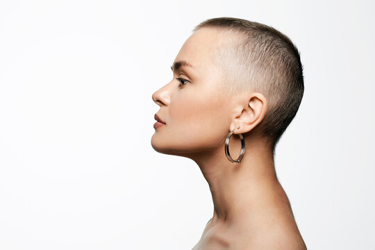 young woman with short haircut. portrait of bald woman