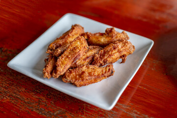 Fried Chicken Mid joint Wings on white plate