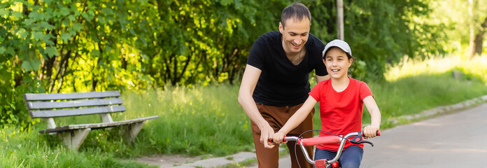 Girl learning to ride bike