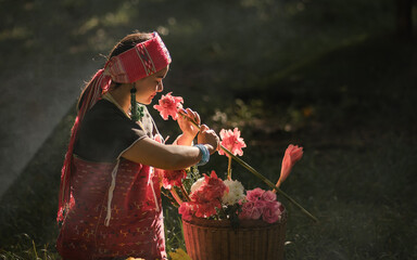 Beautiful Asian young tribal lady in the native traditional dress culture of Karen people minority...