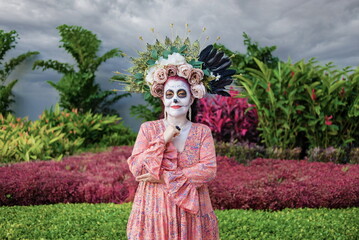 Portrait of woman made up as a catrina, for the celebration of the day of the dead. Woman made up as a catrina.