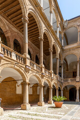 Palermo, Italy - July 6, 2020: Courtyard of Palazzo dei Normanni (Palace of the Normans, Palazzo Reale) in Palermo city. Royal Palace was the seat of the Kings of Sicily during the Norman domination