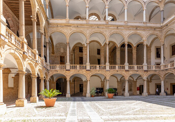 Palermo, Italy - July 6, 2020: Courtyard of Palazzo dei Normanni (Palace of the Normans, Palazzo...