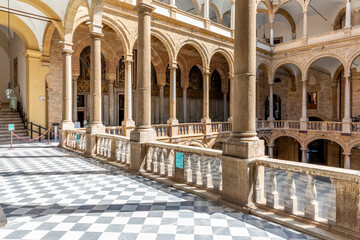 Fototapeta premium Palermo, Italy - July 6, 2020: Courtyard of Palazzo dei Normanni (Palace of the Normans, Palazzo Reale) in Palermo city. Royal Palace was the seat of the Kings of Sicily during the Norman domination
