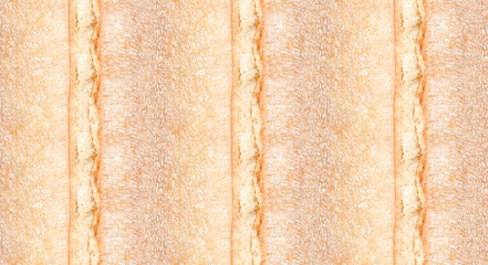 Pattern texture repeating seamless. Homemade fresh crunchy sourdough bread. Background. Сlose up view from top. Proper nutrition. Texture of baked crust of healthy whole wheat bread. Bakery