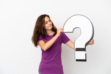 Young caucasian woman isolated on white background holding a question mark icon