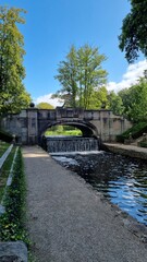 Fototapeta na wymiar Stone bridge in Ludwigsluster Schloss Park