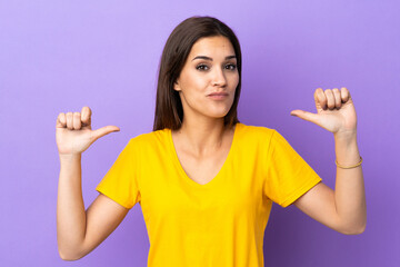 Young caucasian woman over isolated background proud and self-satisfied