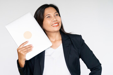 Working Business Woman in Black Suit Jacket Holding Labtop Computer