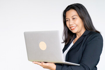 Working Business Woman in Black Suit Jacket Holding Labtop Computer