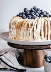 burnt meringue birthday cake with blueberries sweet torte vanilla cake happy feels peace of cake 