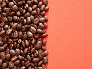 coffee beans. roasted coffee beans on red background