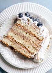 burnt meringue birthday cake with blueberries sweet torte vanilla cake happy feels peace of cake 