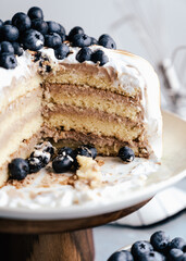 burnt meringue birthday cake with blueberries sweet torte vanilla cake happy feels peace of cake 