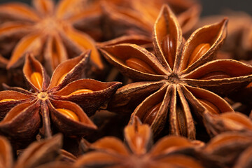 Star anise flat lay as background. Indian spices close up. Medicinal herbs and spices.