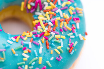 Macro shot of colorful sprinkles on a donut. Background banner. Free space.