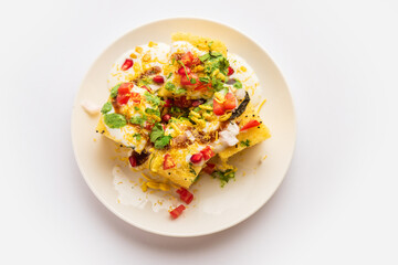 Khaman Dhokla chaat is a very simple and refreshing fusion chaat recipe made using leftover dhokla