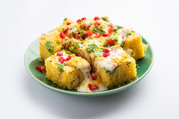 Khaman Dhokla chaat is a very simple and refreshing fusion chaat recipe made using leftover dhokla