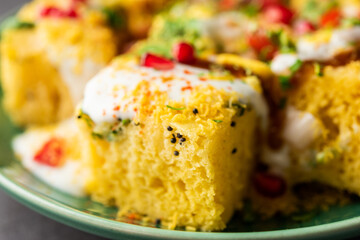 Khaman Dhokla chaat is a very simple and refreshing fusion chaat recipe made using leftover dhokla