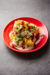 Khaman Dhokla chaat is a very simple and refreshing fusion chaat recipe made using leftover dhokla
