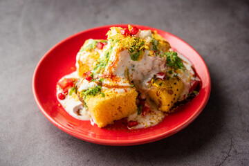 Khaman Dhokla chaat is a very simple and refreshing fusion chaat recipe made using leftover dhokla