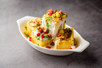 Khaman Dhokla chaat is a very simple and refreshing fusion chaat recipe made using leftover dhokla