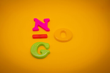the word 'no' to 'go'. Beautiful yellow background. Concept. Copy space.