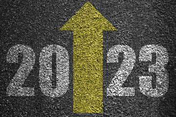 2023 year goals concept. 2023 year lettering with arrow on asvalt road. Plan, goal, task and path to success as you enter the new year