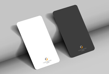 Mockup of a realistic business card with rounded corners, on a textured background with realistic shadows. Vector illustration EPS 10