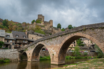 Fototapeta na wymiar Belcastel medieval castle and town in the south of France, Aveyron Occitania, view of the antique medieval stone buildings, High quality photo