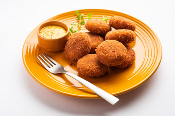Macher Chop - Bengali style fish cutlet or pakora, a popular festival snack from west Bengal
