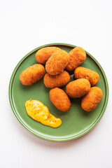 Macher Chop - Bengali style fish cutlet or pakora, a popular festival snack from west Bengal