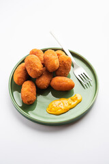 Macher Chop - Bengali style fish cutlet or pakora, a popular festival snack from west Bengal