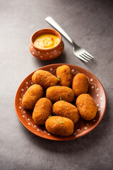 Macher Chop - Bengali style fish cutlet or pakora, a popular festival snack from west Bengal
