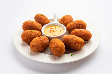 Macher Chop - Bengali style fish cutlet or pakora, a popular festival snack from west Bengal