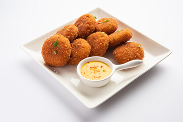 Macher Chop - Bengali style fish cutlet or pakora, a popular festival snack from west Bengal