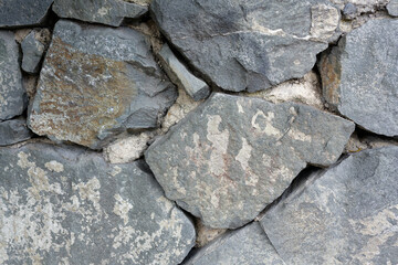 Old Stone wall brown, grey  light blue colour.