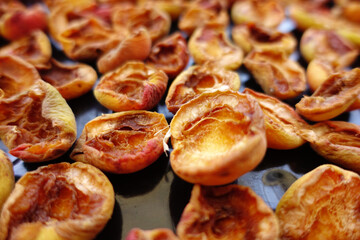 drying apricots in the sun, fruit drying, dried apricots, natural apricot drying,