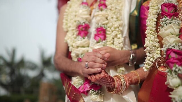 A Slow Motion Shot of Rituals being done with an Indian Couple at their Indian Wedding in India