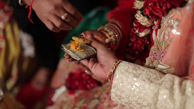 A Slow Motion Shot of Rituals being done with an Indian Couple at their Indian Wedding in India