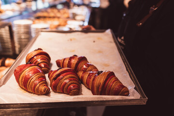 Croissants on a tray in a bar
