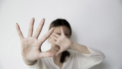 Stop hurting woman! young female person raised her hand for stop violence, sexual abuse, human...