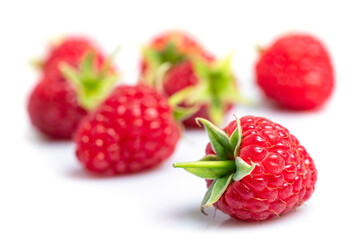 Closeup of red raspberry berries on white background