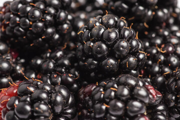 Fresh ripe blackberries as background close up, top view