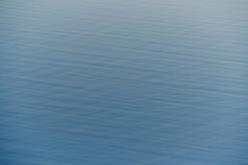 Abstract blue background water surface.