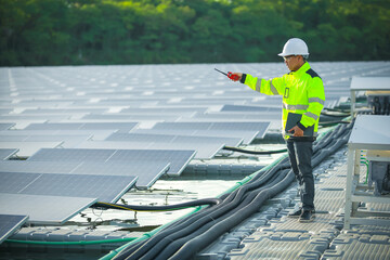 Portrait of professional man engineer working checking the panel