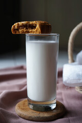 A glass of milk and a half of traditional mooncake